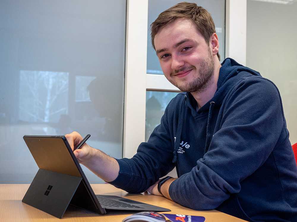 Aero team member performing programming tasks